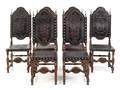 A Set of Six Spanish Baroque Style Walnut Dining Chairs