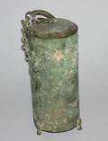 A Chinese Archaic Bronze Style Cylindrical Storage Vessel