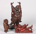 A Group of Three Chinese Carved Wood Figures of Hotei
