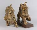 A Pair of Southeast Asian Giltwood Foo Dogs