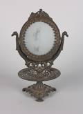 A Cast Iron Dressing Mirror
