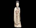 67 CARVED AND POLYCHROMED IVORY FIGURE OF A BEAUTY