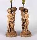 A Pair of Terracotta Figural Table Lamps