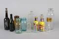 A Collection of Glass Bottles and Jars