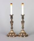 A Pair of Silver Plate Candlesticks