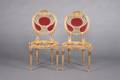 A Pair of Louis XVI Style ParcelGilt Sidechairs