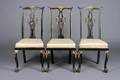 A Group of Three Georgian Style Ebonized and Parcel Gilt Side Chairs