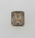 A Ladys 14 Karat Yellow Gold and Smoky Quartz Ring