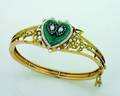 A Ladys Yellow Gold Cultured Pearl Diamond Green and White Enamel Hinged Bangle Bracelet