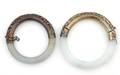 A Pair of Chinese Jadeite and Silver Bangle Bracelets