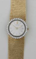 A Ladys 18 Karat Yellow Gold and Diamond Wristwatch Corum
