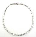 A Ladys 18 Karat White Gold and Diamond Line Necklace