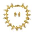 A Ladys 18 Karat Yellow Gold and Diamond Necklace and Earring Set Barry KieselsteinCord