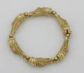 A Ladys 18 Karat Yellow Gold Alligator Link Bracelet Barry KieselsteinCord