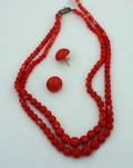 A Ladys Graduated Double Strand Dark Salmon Coral Bead Necklace
