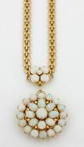 A Ladys 14 Karat Yellow Gold and White Opal Necklace