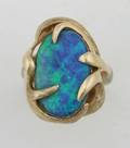 A Ladys 14 Karat Yellow Gold and Opal Doublet Ring
