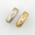 A Pair of Ladys Yellow Gold White Gold and Diamond Rings