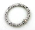 A Ladys 18 Karat White Gold Flexible Bangle Bracelet Chimento