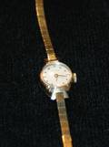 A Ladys 14 Karat Yellow Gold Wristwatch Longines