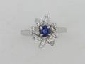 A Ladys White Gold Blue Sapphire and Diamond Ring