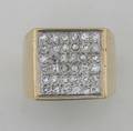 A Ladys 14 Karat Yellow Gold and Diamond Ring