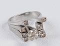 171 FOURTEEN KARAT WHITE GOLD AND DIAMOND RING