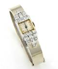 A Ladys 14 Karat White Gold Platinum and Diamond Hinged Cuff Bracelet Watch