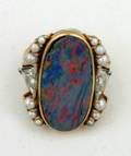 A Ladys Yellow Gold Black Opal Diamond and Cultured Pearl Ring