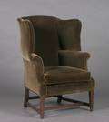 An English Upholstered Wingback Armchair