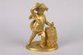 A Gilt Bronze Figure of a Cherub Working a Tool against a Barrel