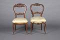 A Group of Two Carved Victorian Side Chairs