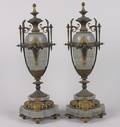 A Pair of Bronze Mounted Marble Urns