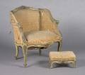 A Louis XV Style Upholstered Armchair with Stool