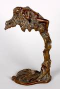 An Art Nouveau Bronze Lamp of a Nude Woman E Thomasson