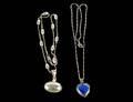 139 TWO STERLING SILVER PENDANTS AND CHAINS