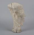 An Eskimo Carved Petrified Whale Bone Sculpture