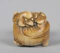 A Japanese Carved Ivory Netsuke
