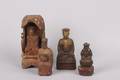 A Group of Four Asian Red Lacquer and Gilt Carved Wood Temple Figures
