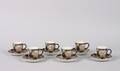 A Set of Six Chelsea Tea Cups and Saucers