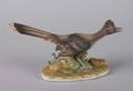 A Bisque Porcelain Figure of a Roadrunner