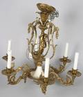A Gilt Metal Louis XV Style Six Light Chandelier