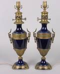 A Pair of French Metal Mounted Porcelain Lamps