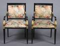 A Pair of Regency Style Ebonized Armchairs