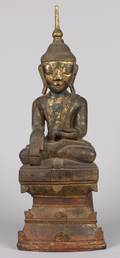 A Thai Carved Wood and Gilt Figure of Buddha