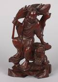 A Chinese Carved Wood Figural Group of a Man and Boy