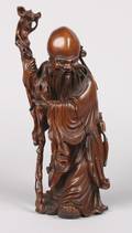 A Chinese Carved Wood Figure of a Lohan