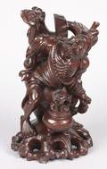 A Chinese Carved Wood Figure of a Lohan