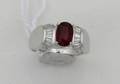 A Ladys 14 Karat White Gold Ruby and Diamond Ring