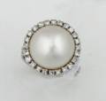 A Ladys White Gold Mabe Pearl and Diamond Ring